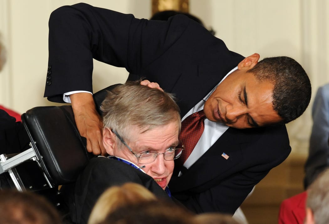 In this file photo taken on August 12, 2009, Stephen Hawking receives the Presidential Medal of Freedom from US President Barack Obama.