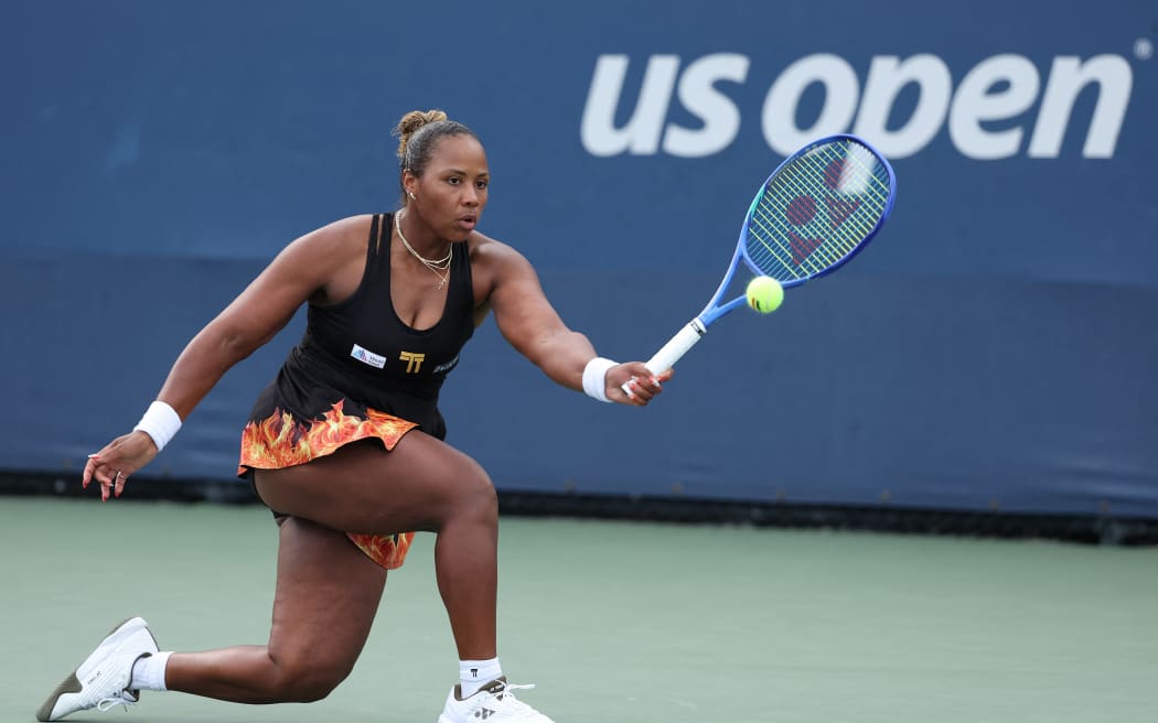 NEW YORK, NEW YORK - AUGUST 27: Taylor Townsend of the United States returns against Jelena Ostapenko of Latvia during their Women's Singles Second Round match on Day Four of the 2025 US Open at USTA Billie Jean King National Tennis Center on August 27, 2025 in the Flushing neighborhood of the Queens borough of New York City.   Clive Brunskill/Getty Images/AFP (Photo by CLIVE BRUNSKILL / GETTY IMAGES NORTH AMERICA / Getty Images via AFP)