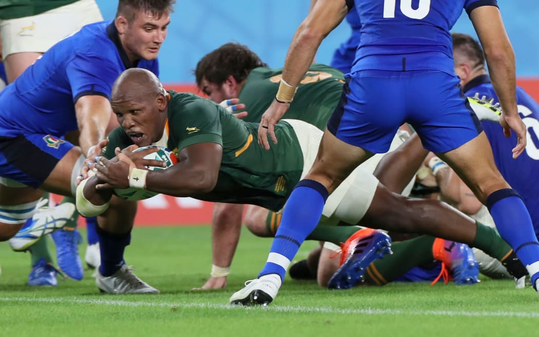 Springbok hooker Mbongeni Mbonambi scores against Italy.