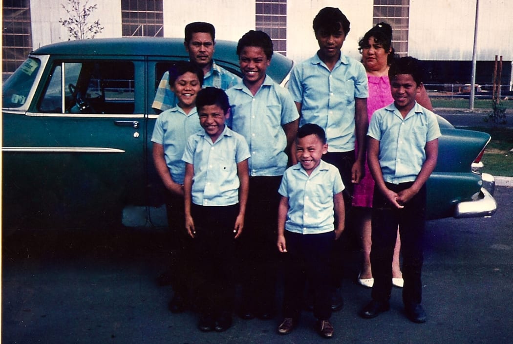 The Filipaina family in front of the family car in Mangere East (Olsen fourth from left).