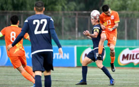 Guam captain Jason Cunliffe challenges for the ball during the Matao's FIFA World Cup and Asian Cup first round qualifying match in Bhutan.