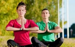 Couple doing yoga