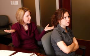 annoyed coworker rolls eyes at boss, women, workers, employee, anger