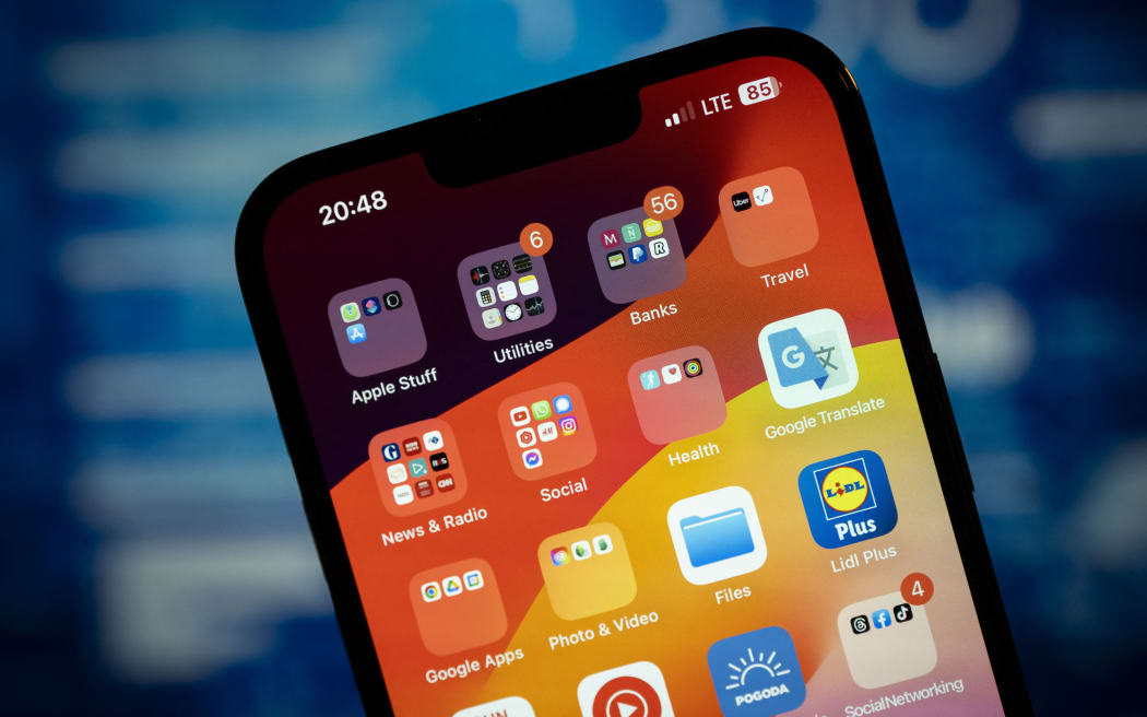 An iPhone home screen is seen with different applications in this illustrtion photo taken in Warsaw, Poland on 21 November, 2023. (Photo by Jaap Arriens/NurPhoto) (Photo by Jaap Arriens / NurPhoto / NurPhoto via AFP)