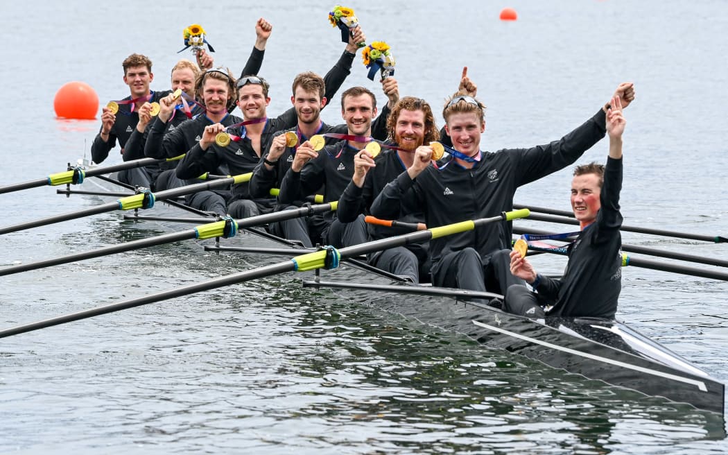 The gold medal-winning New Zealand eight at the Tokyo Olympics.