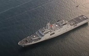 Chinese warships sail through the Sydney Heads.