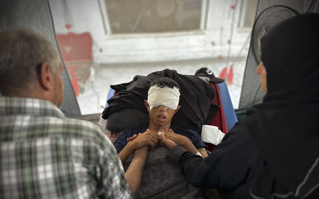 AFP reports Taha Abu Libdeh, 18, lost his eyesight in Gaza, after being shot by an Israeli sniper while attempting to rescue a wounded person, while doctors were hindered by shortages of medicine and equipment.