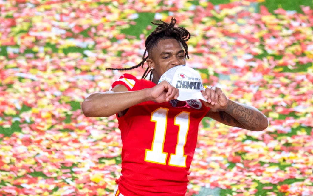 Kansas City Chiefs Wide Receiver Demarcus Robinson shows his Super Bowl Champions hat as he celebrates the Kansas City Chiefs winning the Super Bowl LIV  game against the San Francisco 49ers.