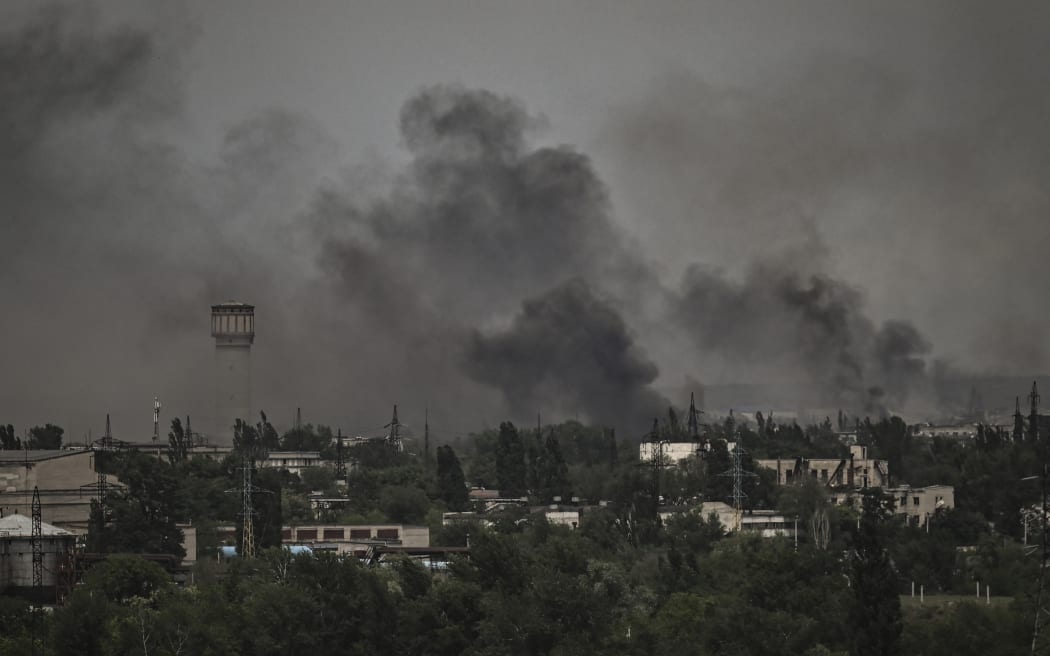 Smoke and dirt rise in the city of Severodonetsk during fighting between Ukrainian and Russian troops at the eastern Ukrainian region of Donbas on 2 June, 2022.