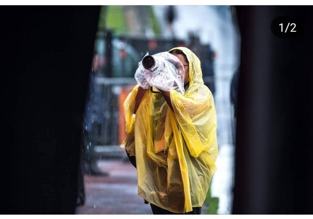 Music photographer Ngamihi Pawa get soaked at Auckland's Mt Smart Sadium