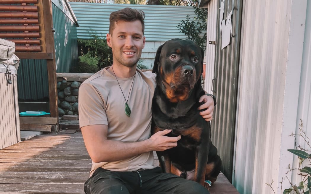 Ryan Tarawhiti-Brown and Chopper after the dog’s release in July 2022.