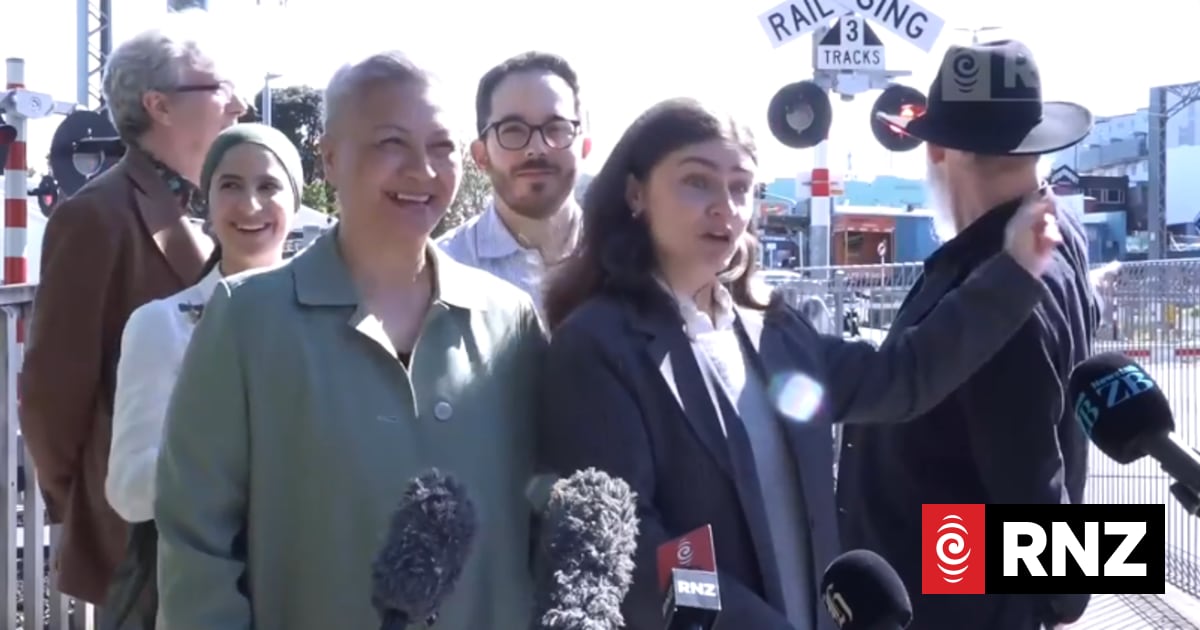 Near miss with train interrupts Greens' level crossing announcement