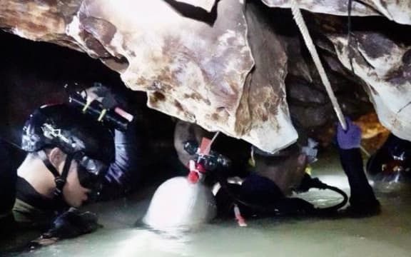 Cave divers in Thailand.