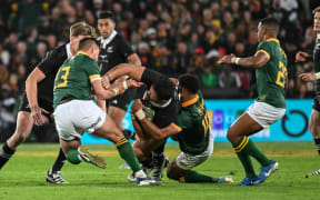 South Africa Springboks v New Zealand All Blacks, Ellis Park, Johannesburg, 2024.
Caleb Clarke is tackled.