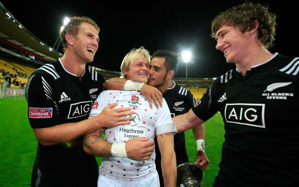 England's Warwick Lahmert jokes with Scott Curry, Beaudine Waaka and Sam Dickson after the final. Day two of the HSBC Sevens, Westpac Stadium, Wellington, New Zealand. Saturday 07 February 2015. Copyright Photo: John Cowpland / www.Photosport.co.nz