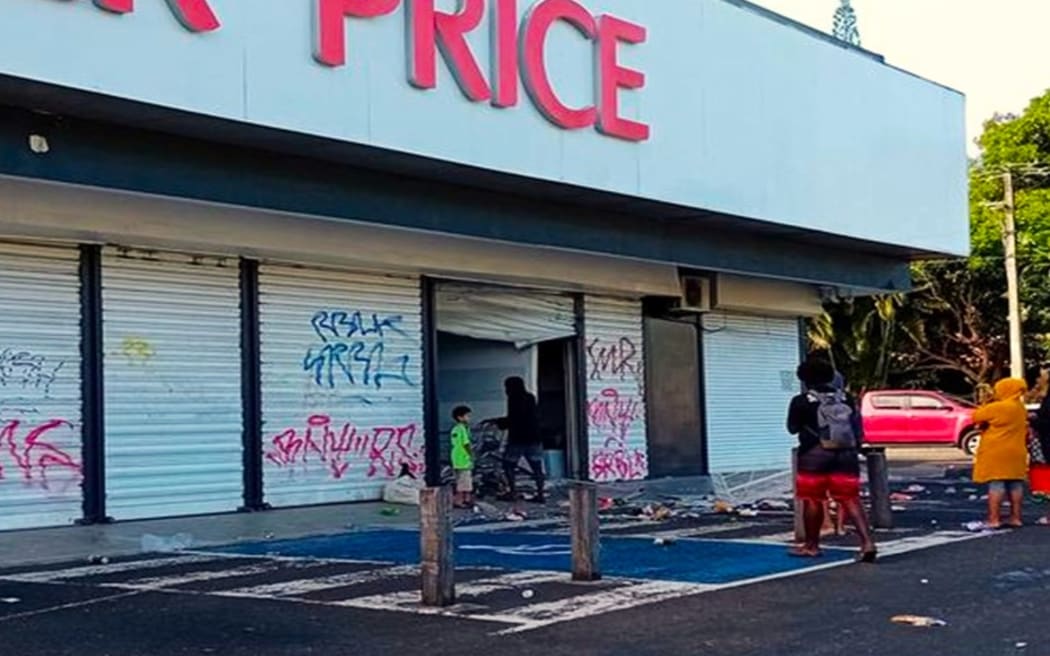 Scenes of looting at a supermarket in the Auteuil district of Nouméa on Tuesday