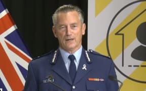 Police Commissioner Mike Bush says three arrests have been made.
