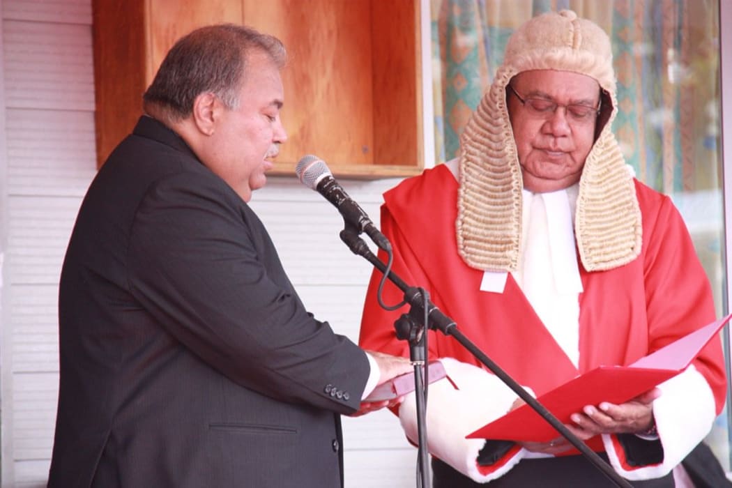 Nauru Chief Justice Ratu Joni Madraiwiwi (right) swears in President Baron Waqa (left) in July 2016.