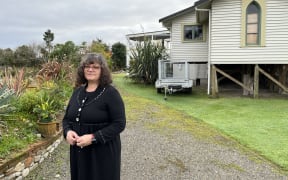 Ruth Vaega outside her Snodgrass Road home, in Westport