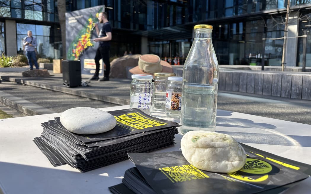 Protesters outside the Canterbury Regional Council offices demand action on nitrate levels.