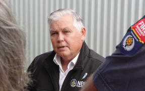 Emergency Management Minister Mark Mitchell talks to emergency responders in Mangawhai.