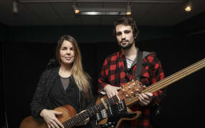 Mel Parsons in studio with base player Josh Logan.