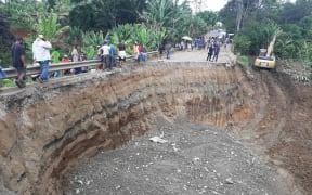 A massive hole has been carved out of the Highlands Highway