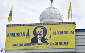A photo of Hardeep Singh Nijjar displayed above the Guru Nanak Sikh Gurdwara temple in Surrey, British Columbia, Canada, after he was shot dead in 2023.