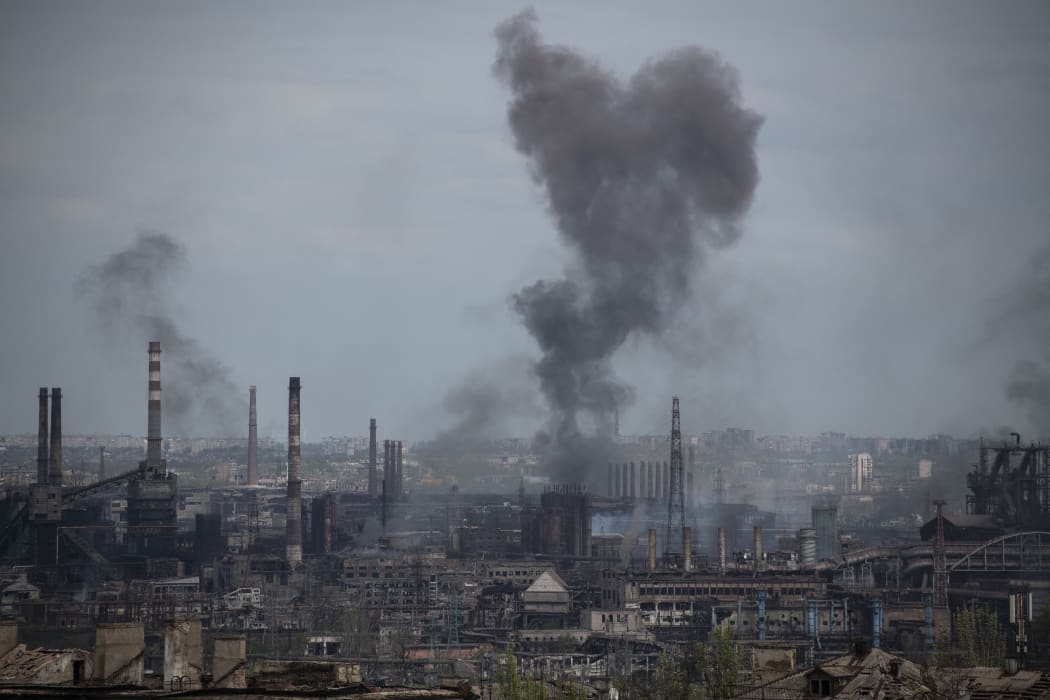 Smoke rises above a plant of Azovstal Iron and Steel Works, as Russia's military operation in Ukraine continues, in the city of Mariupol.
