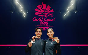 Joelle King won gold in the women's squah singles and Paul Coll took out silver in the men's singles at the Commonwealth Games.