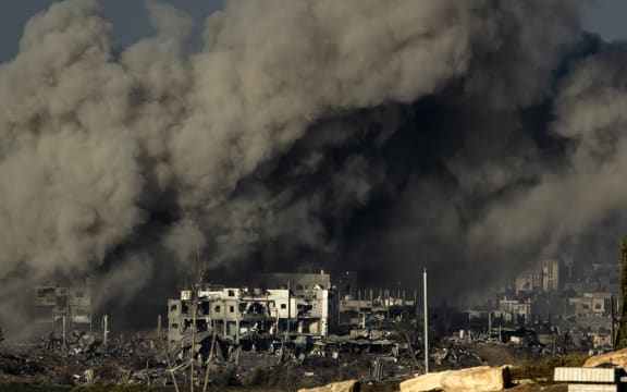 Smoke rises during an Israeli military bombardment of the northern Gaza Strip on November 15, 2023, amid the ongoing battles between Israel and the Palestinian group Hamas. Thousands of civilians, both Palestinians and Israelis, have died since October 7, 2023, after Palestinian Hamas militants based in the Gaza Strip entered southern Israel in an unprecedented attack triggering a war declared by Israel on Hamas with retaliatory bombings on Gaza. (Photo by FADEL SENNA / AFP)