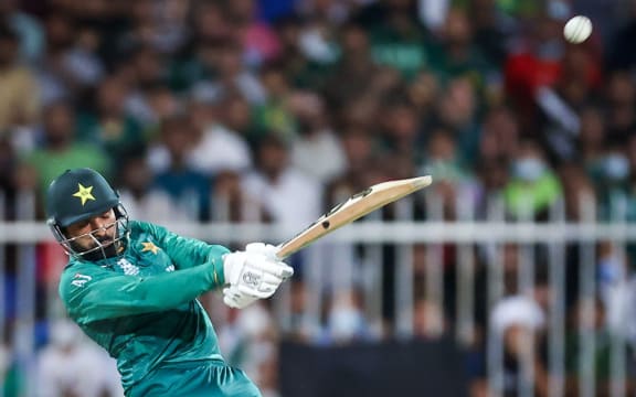 Pakistan's Asif Ali hits a six.