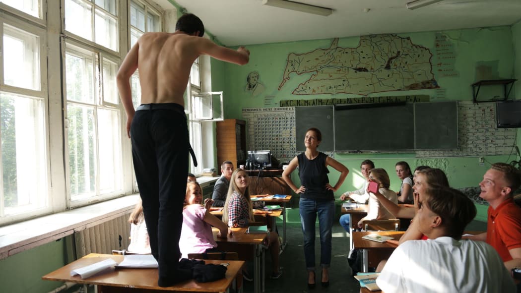 Ardent young school student Pyotr Skvortsov makes a point to his classmates in The Student.