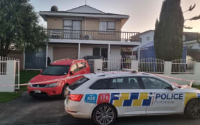 A police car at Moncrieff Avenue, Clendon Park, on Friday after at least one body was discovered on Thursday 11 August 2022.