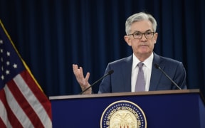 US Federal Reserve Chair Jerome  Powell announces a half percentage point interest rate cut.