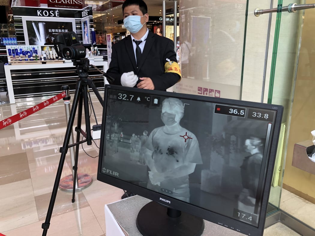 Temperature check at Top City department store in Taiwan