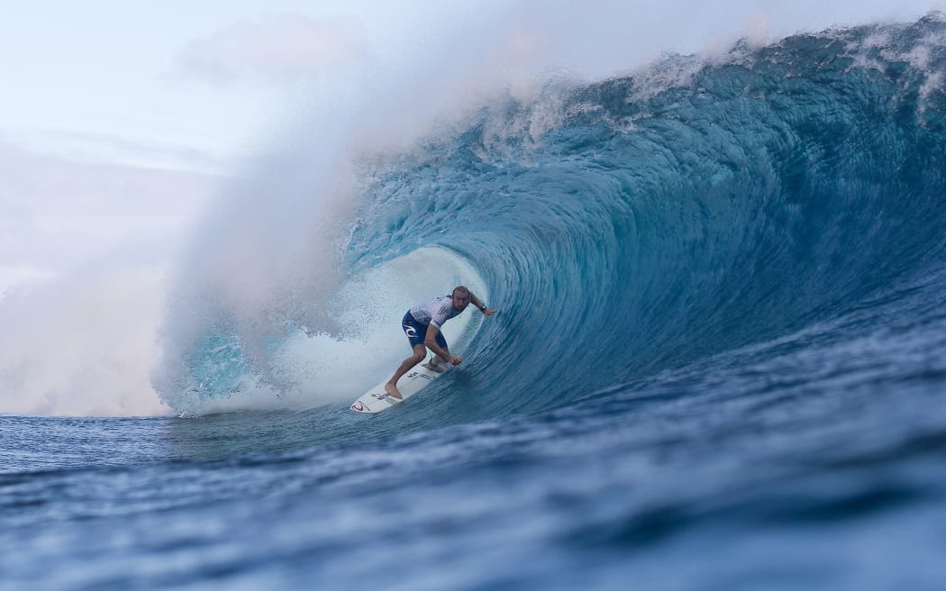Owen Wright of  Australia winning in Round 4 of the Billabong Pro Tahiti at Teahupoo, Tahiti on 24 August 2015.
