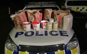 Police say the offenders were found with  "a car boot full" of KFC.