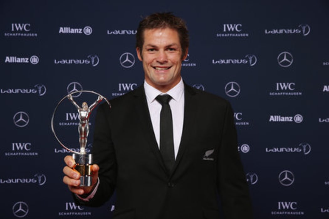 Richie McCaw with the All Blacks Laureus team award.