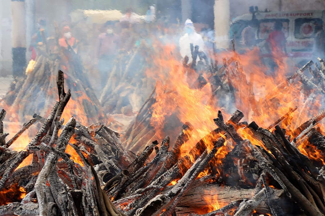 India's second Covid-19 wave has had a devastating human toll. Funeral pyres in New Delhi.