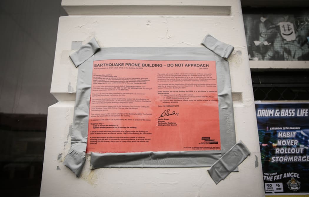 Toomath Building on Ghuznee Street in Wellington has had a red sticker for many years. 'Do not approach' sticker on the exterior of the building.