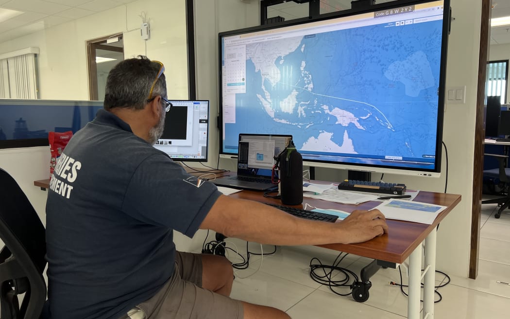 Marshall Islands Marine Resources Authority's offshore fisheries advisor Francisco Blaha at the fisheries authority's Majuro headquarters reviews satellite imagery of fishing vessels active in the western Pacific region. Photo: Giff Johnson.