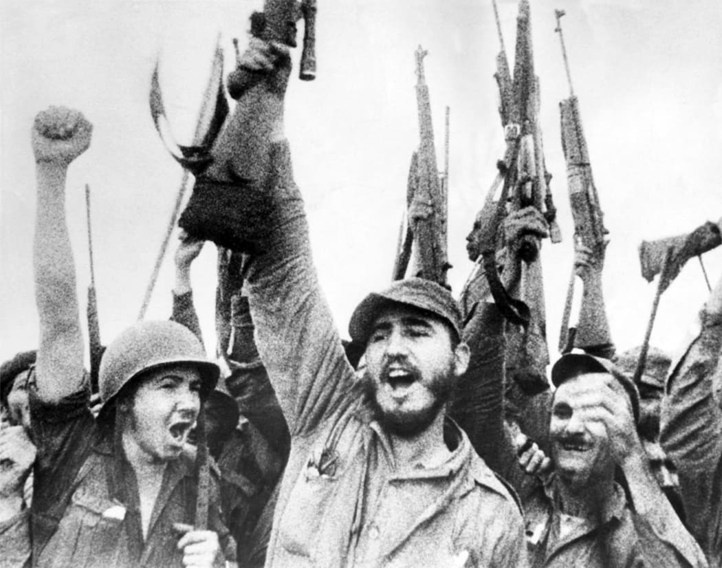 Cuba: Fidel Castro celebrating with revolutionary comrades.