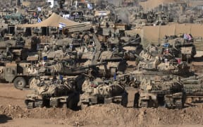 Israeli army tanks are seen stationed in an area of Israel's southern border with the Gaza Strip on June 2, 2024, amid the ongoing conflict between Israel and the Palestinian militant group Hamas.