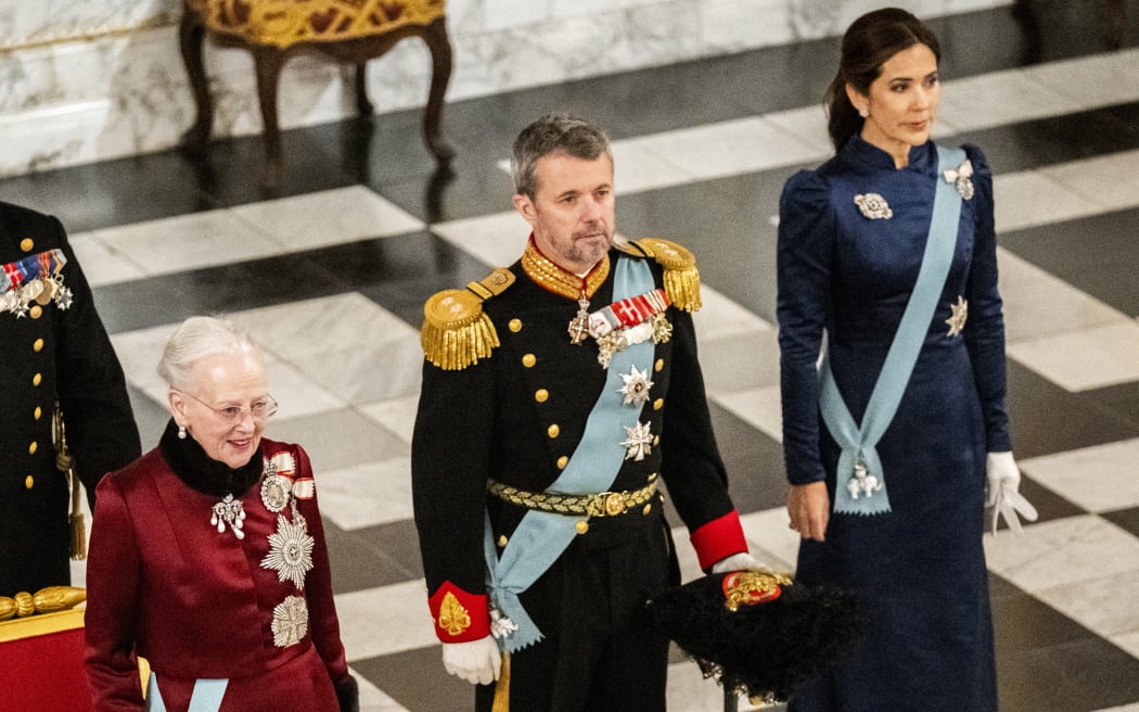 Queen Margrethe II of Denmark, Crown Prince Frederik of Denmark and Crown Princess Mary of Denmark greet the diplomatic corps during a New Year reception at Christiansborg Palace, Copenhagen on 3 January 2024. (Photo by Ida Marie Odgaard / Ritzau Scanpix / AFP)