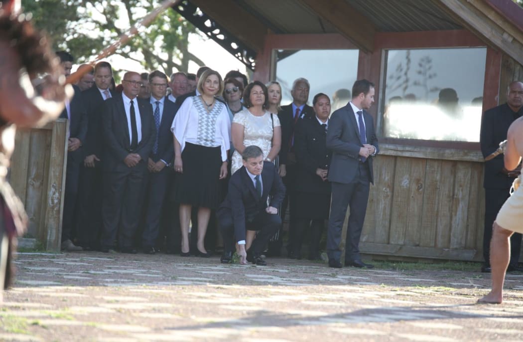 Prime Minister Bill English is welcomed onto Hoani Waititi Marae during Waitangi Day celebrations.