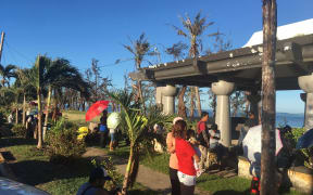 Locals in the CNMI waiting to get food stamps after category five Super Typhoon Yutu devastated the island and neighboring Tinian.