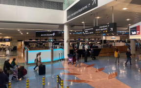 Passengers head to departures at Auckland Airport on the day the trans-Tasman bubble opened, 19 April 2021.