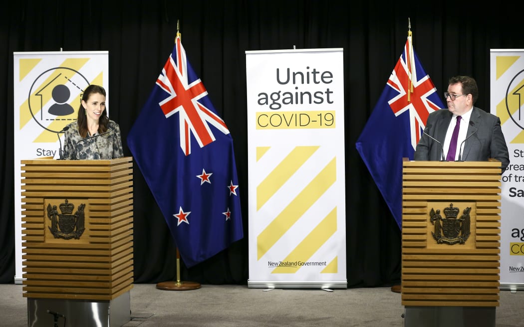 Prime Minister Jacinda Ardern and Finance Minister Grant Robertson speak to media during a press conference at Parliament on April 02, 2020.
