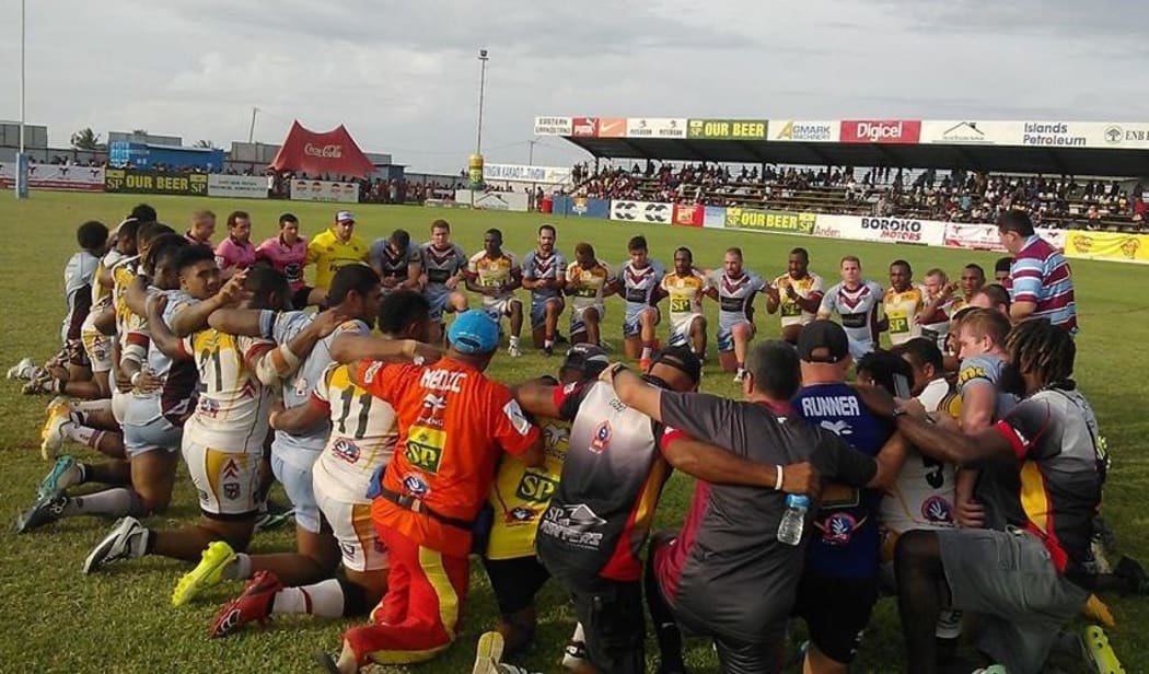 PNG Hunters and Central Queensland Capras players #takeakneeforackers following their Queensland Cup clash in Kokopo.